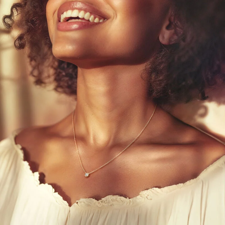 A necklace featuring 0.15-carat lab-grown diamonds bezel-set in 18K gold plated with sterling silver. - Image 6