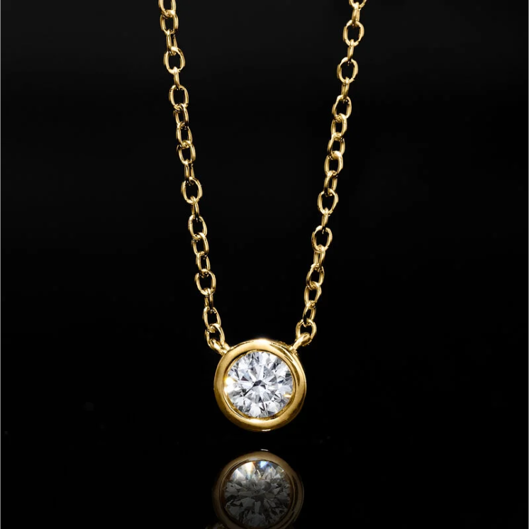 A necklace featuring 0.15-carat lab-grown diamonds bezel-set in 18K gold plated with sterling silver. - Image 4