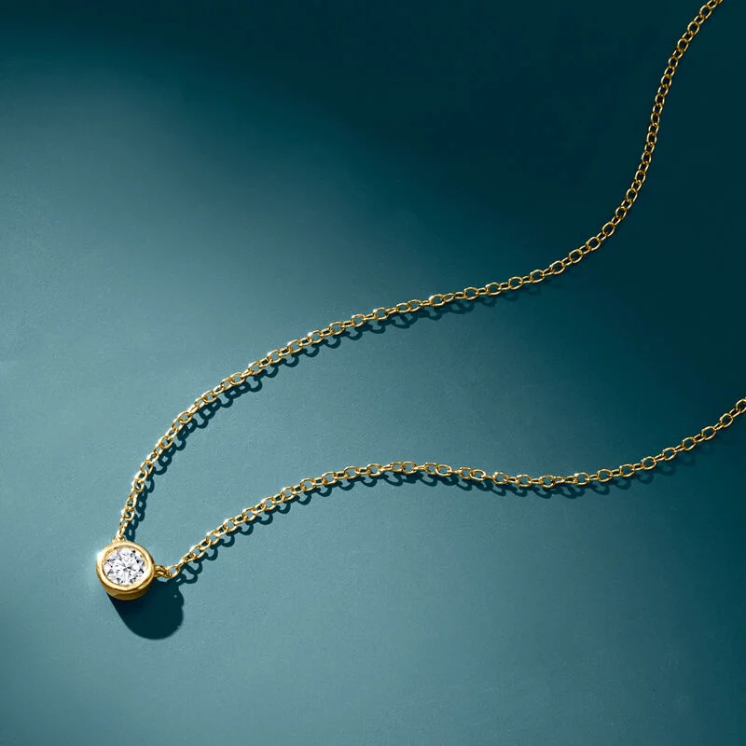 A necklace featuring 0.15-carat lab-grown diamonds bezel-set in 18K gold plated with sterling silver. - Image 3