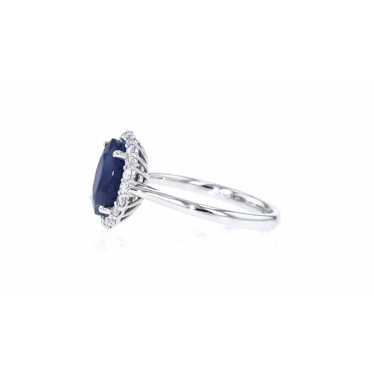 A halo ring featuring a 3.60-carat sapphire and 0.35-carat diamonds in 14K white gold. - Image 3
